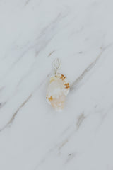 Wings Hawaii Triton Shell necklace charms in sterling silver. Fine shell jewelry handcrafted in Maui. Modern beachy charm necklaces handmade with authentic Hawaiian sea shells.  thumbnail