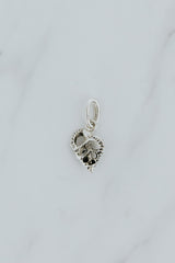Wings Hawaii Forever Triton Shell cross-section necklace charm in sterling silver or solid 14k yellow gold. Fine jewelry handcrafted in Maui. Modern charm necklaces handmade in Hawaii. 