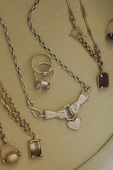 Wings Hawaii Stolen Heart Necklace in sterling silver, shown with others thumbnail