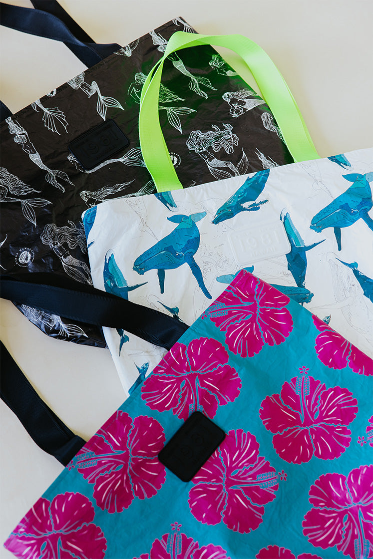 Collection of three Wings Hawaii adventure tote bags