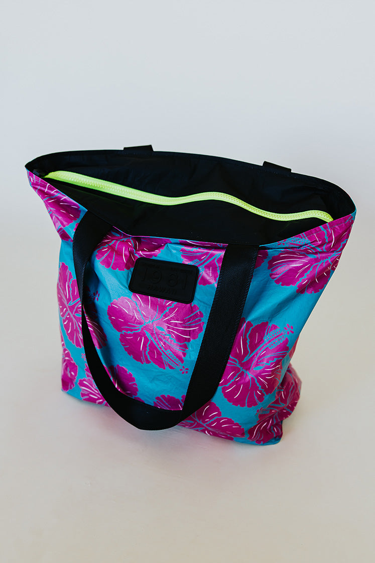 Wings Hawaii foldable Tyvek tote bag in hibiscus print