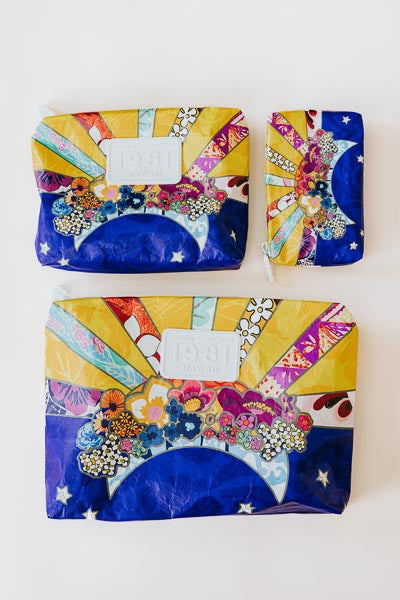wings hawaii tyvek adventure pouches in sun + moon collage print
