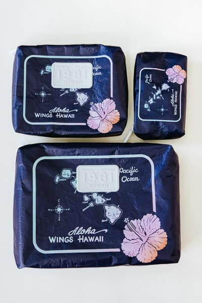 Wings Hawaii Tyvek adventure pouches in retro vintage Hawaiian island chain map print 