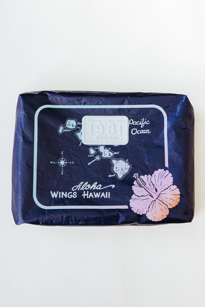 Wings Hawaii Tyvek adventure pouches in retro vintage Hawaiian island chain map print 