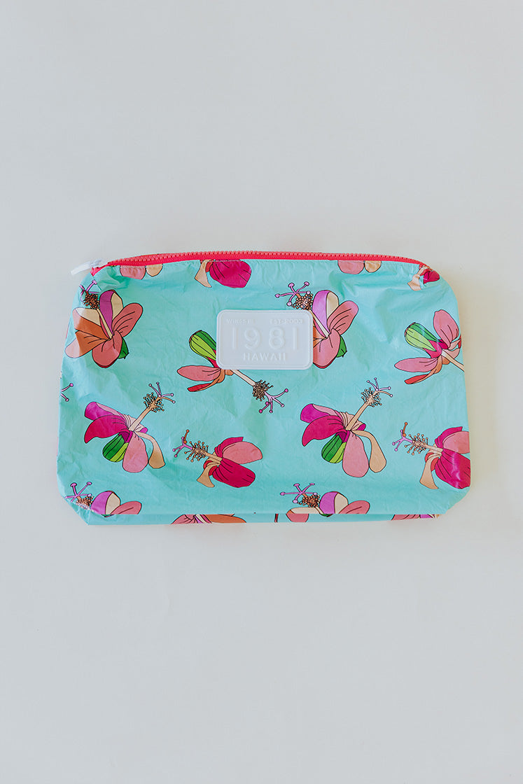 Wings Hawaii foldable Tyvek adventure tote in kokio hibiscus print 