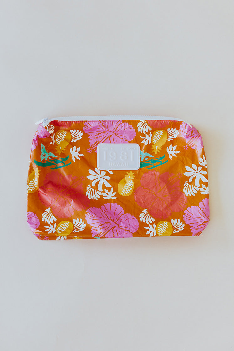 Wings Hawaii adventure pouch in orange aloha print 