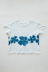 Wings Hawaii women's Hibiscus Tee in hemp. White with blue tropical floral print. Designed in Maui, made in Bali. Small batch, sustainable apparel. Vintage tropical aloha style vibes.  thumbnail