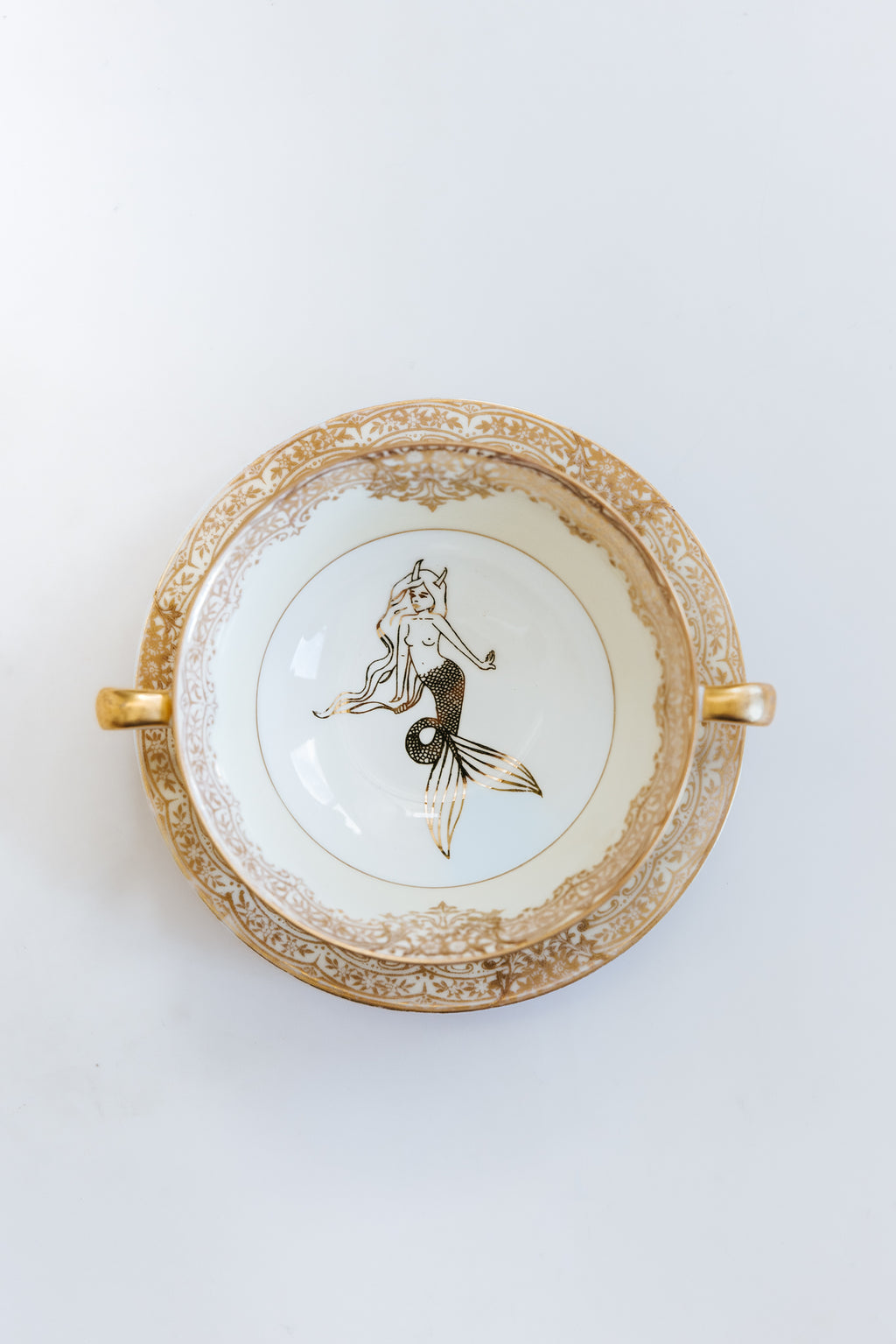 Wings Hawaii upcycled vintage soup bowl and saucer set. Adorned with devilish mermaid and seahorse original artwork. One of a kind dishware handmade in Maui. 
