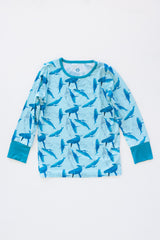 Wings Hawaii Kohola kids pajamas set with humpback whales print. Original artwork designed in Maui. Island style keiki gifts. Long sleeved shirt with pajama pants. Small batch, sustainable, unique children’s apparel.  thumbnail