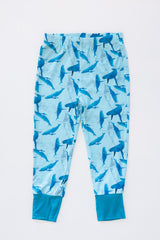 Wings Hawaii Kohola kids pajamas set with humpback whales print. Original artwork designed in Maui. Island style keiki gifts. Long sleeved shirt with pajama pants. Small batch, sustainable, unique children’s apparel.  thumbnail