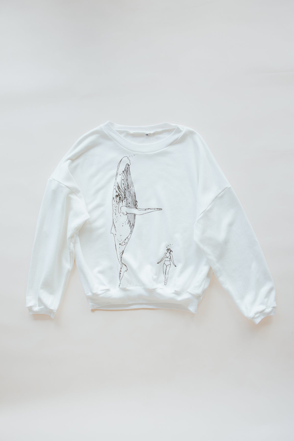 Wings Hawaii whale dance sweatshirt in french terry cotton. Humpback whale and diver print, original artwork. Screenprinted in Maui. 