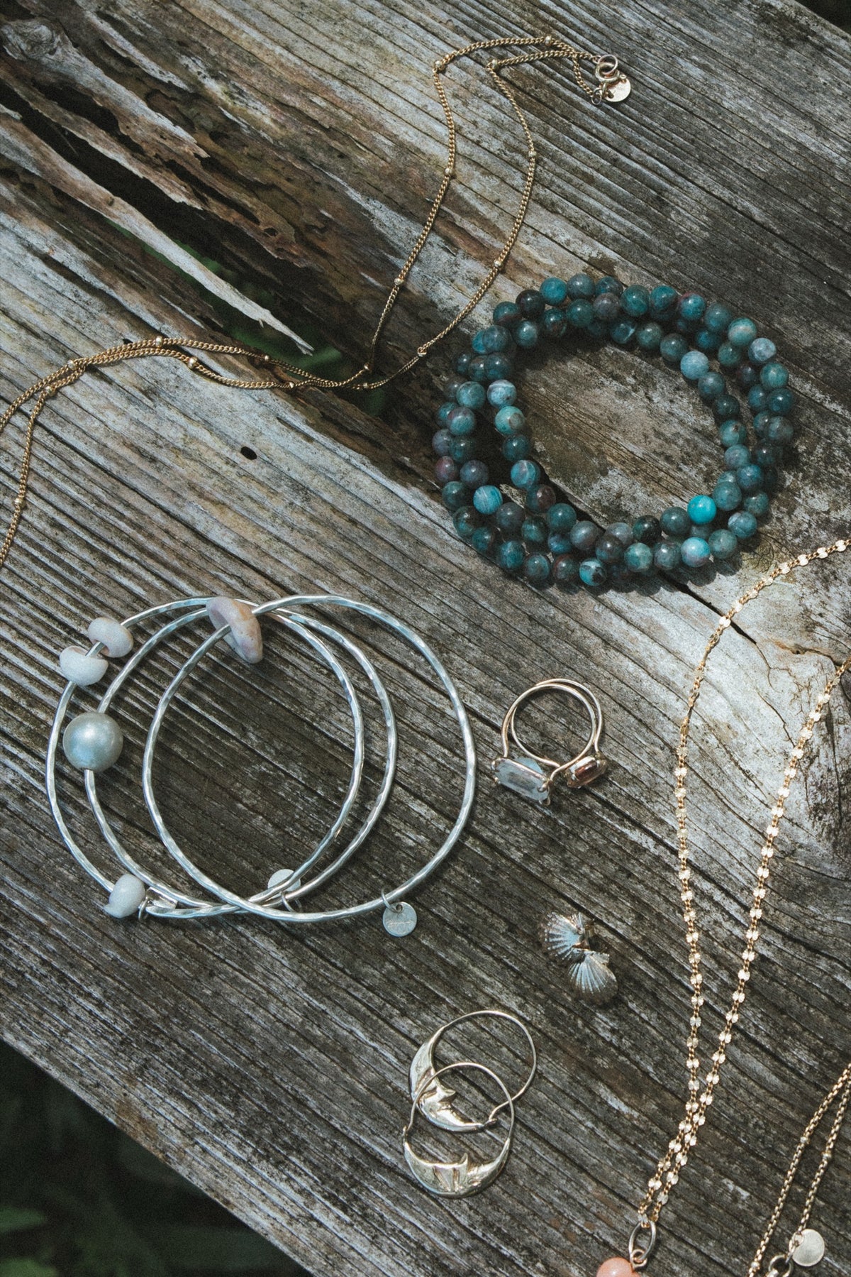 Bangles and rings on weathered wood