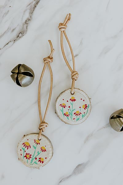 wings hawaii hand-painted wood ornaments white with flowers and leather hoop