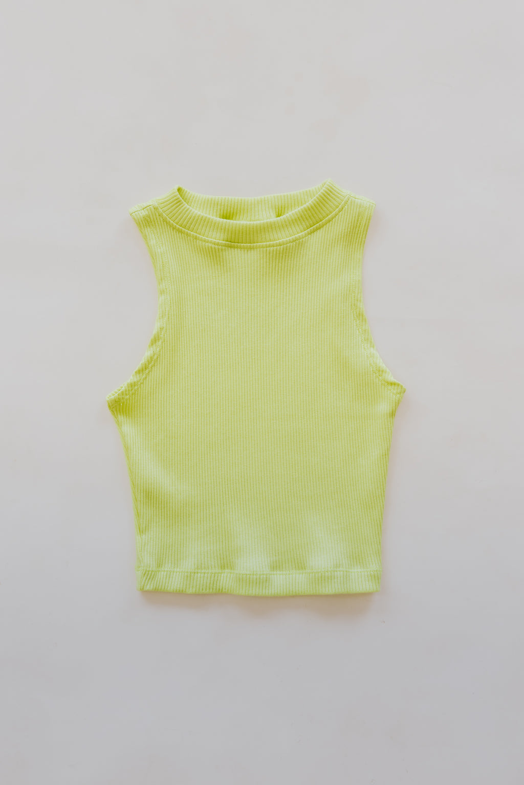 Wings Hawaii Ribbed Lexi Tank Top. Stretchy high neck cropped muscle tank top in Lime green. Designed in Maui, sewn in Bali. Sustainable, small batch, boho beachy chic women's apparel. 