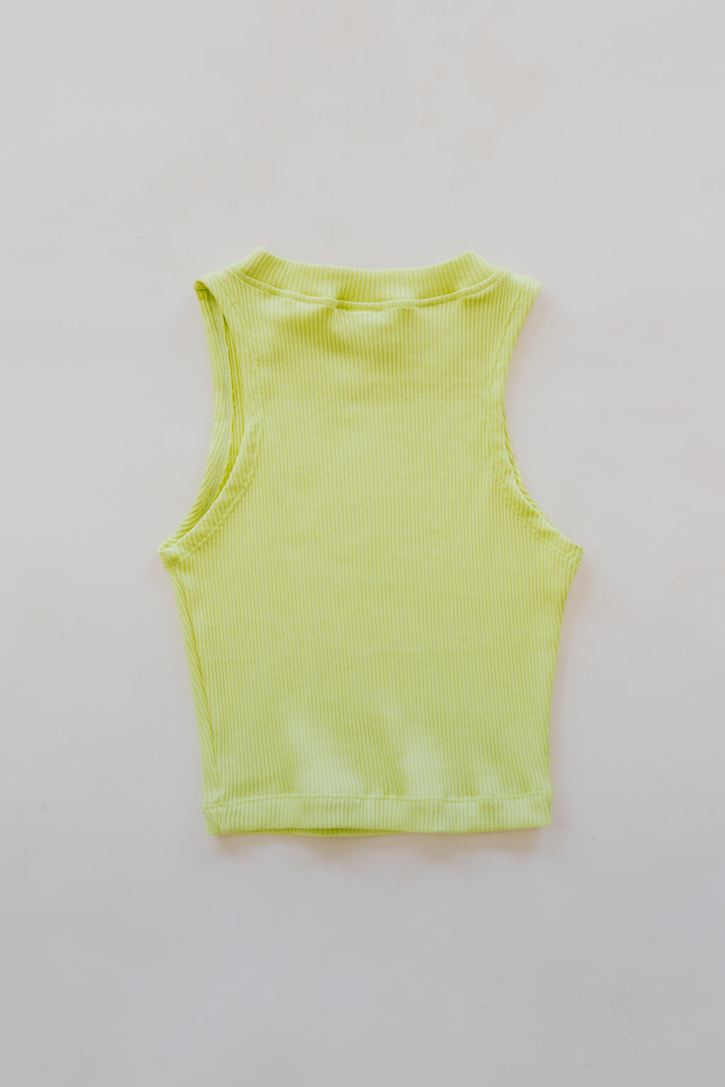 Wings Hawaii Ribbed Lexi Tank Top. Stretchy high neck cropped muscle tank top in Lime green. Designed in Maui, sewn in Bali. Sustainable, small batch, boho beachy chic women's apparel. 