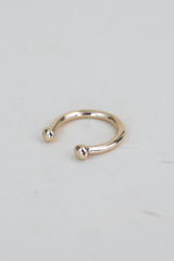 A Womens ring in the shape of a horse shoe thumbnail