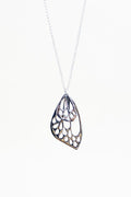 small and large butterfly wing made of sterling silver hanging on silver chain necklace