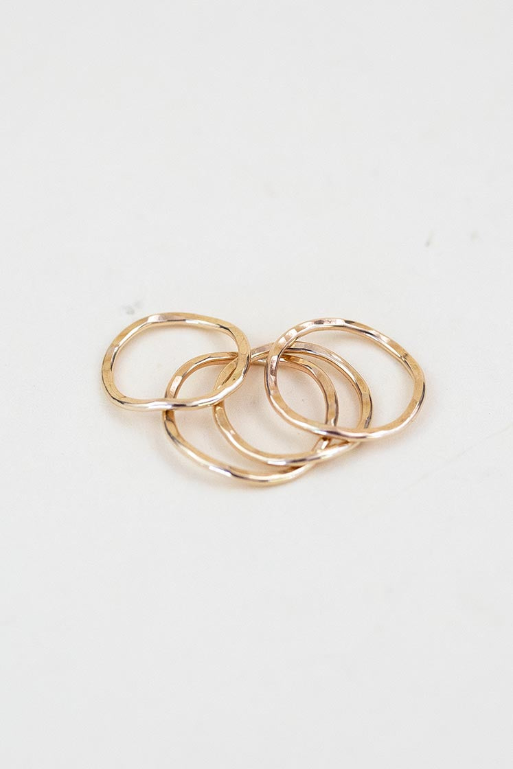 Wings Hawaii ti leaf stacking rings in 14k gold-filled or sterling silver. Fine jewelry handmade in Maui. Beachy, boho, organic, freeform wavy-shaped rings. 
