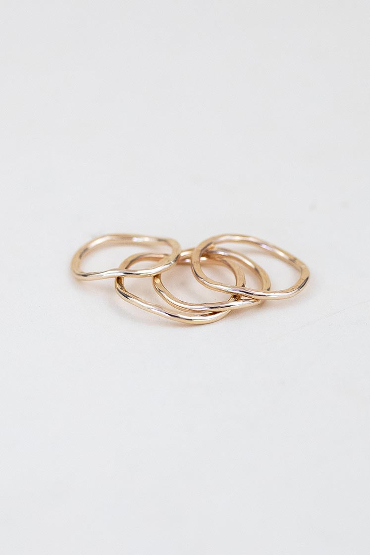 Wings Hawaii ti leaf stacking rings in 14k gold-filled or sterling silver. Fine jewelry handmade in Maui. Beachy, boho, organic, freeform wavy-shaped rings. 