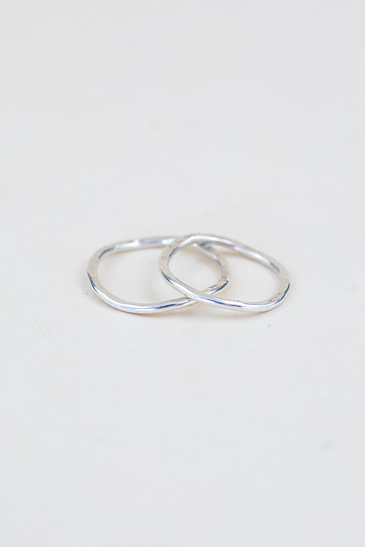 Wings Hawaii ti leaf stacking rings in 14k gold-filled or sterling silver. Fine jewelry handmade in Maui. Beachy, boho, organic, freeform wavy-shaped rings. 