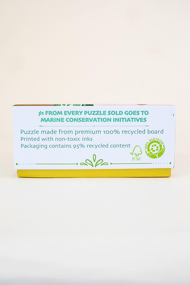 surf shack puzzle A super fun puzzle made of premium 100% recycled Eska board. Printed with non-toxic inks and a matte finish. Art by illustrator Kim Sielbeck based in Hawai'i. 