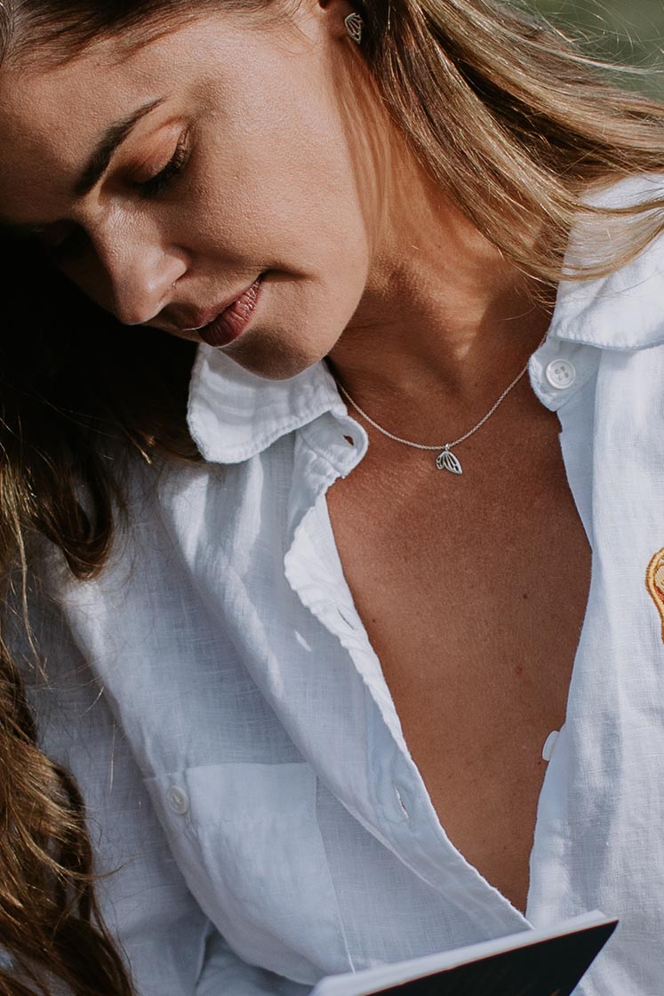 tiny butterfly wing necklace in sterling silver or 14k gold women's jewelry simple minimal elegant everyday pieces to wear and cherish hand made in haiku maui wings hawaii